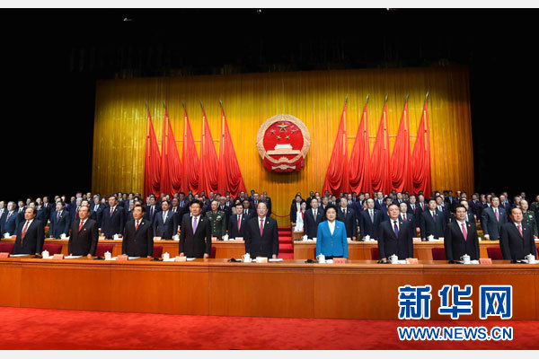 10月1日，慶祝中華人民共和國成立66周年暨新疆維吾爾自治區成立60周年大會在新疆人民會堂隆重舉行。 新華社記者 饒愛民 攝