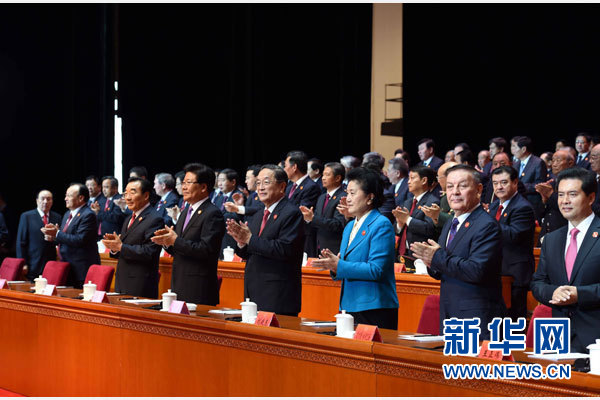 10月1日，慶祝中華人民共和國成立66周年暨新疆維吾爾自治區成立60周年大會在新疆人民會堂隆重舉行。 新華社記者 饒愛民 攝 