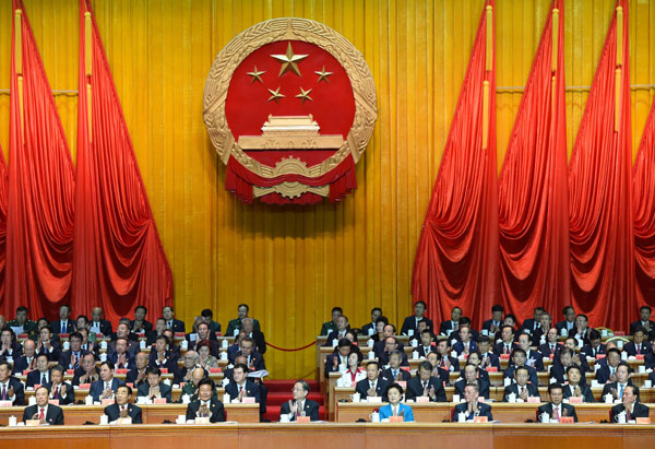 10月1日，慶祝中華人民共和國成立66周年暨新疆維吾爾自治區成立60周年大會在新疆人民會堂隆重舉行。 新華社記者 高潔 攝 