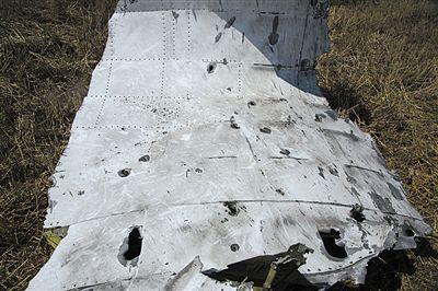MH17墜機現場照片下藏著多少信息？