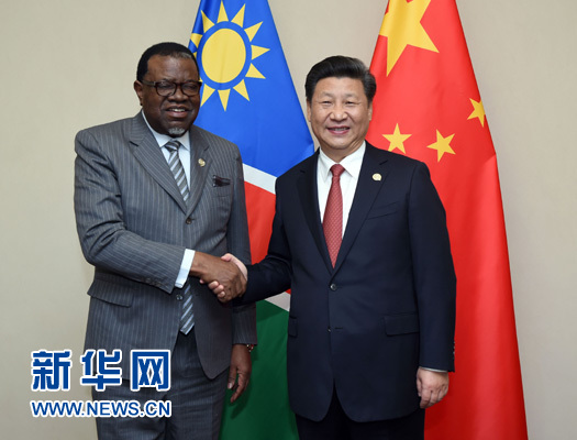 12月4日，國(guó)家主席習(xí)近平在約翰內(nèi)斯堡會(huì)見納米比亞總統(tǒng)根哥布。 新華社記者 張鐸 攝