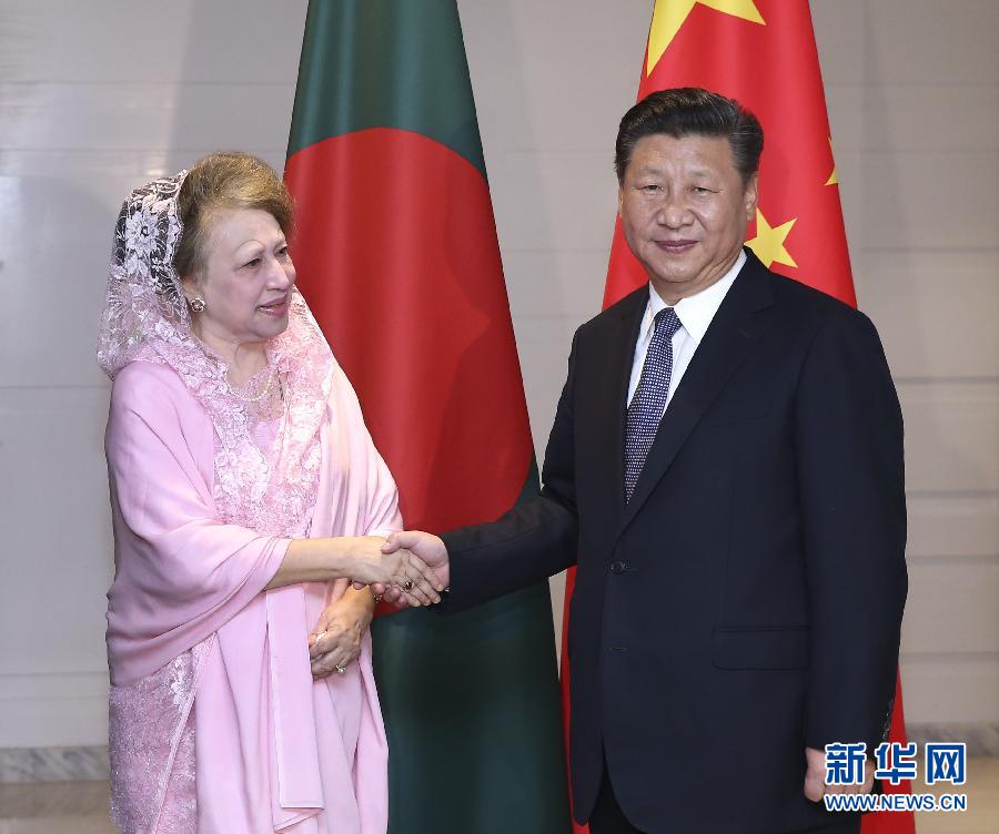10月14日，國家主席習(xí)近平在達卡會見孟加拉國民族主義黨主席卡莉達·齊亞。  新華社記者龐興雷攝 